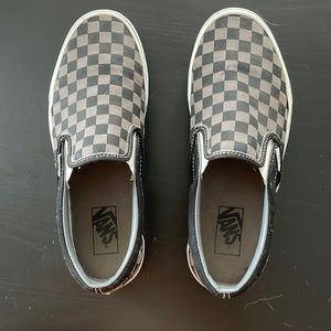 Vans slip on tennies.